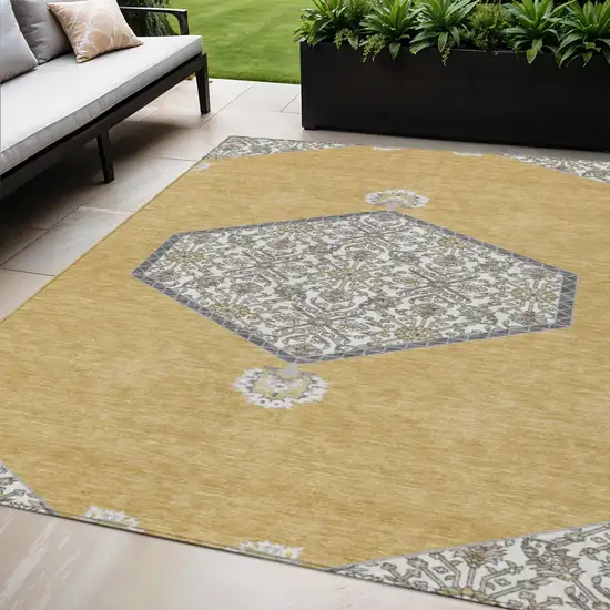Gold Ivory And Beige Oriental Washable Indoor Outdoor Area Rug Photo 1