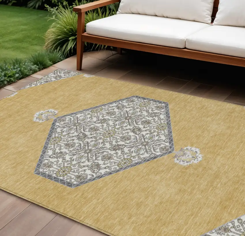 Gold Ivory And Beige Oriental Washable Indoor Outdoor Area Rug Photo 1