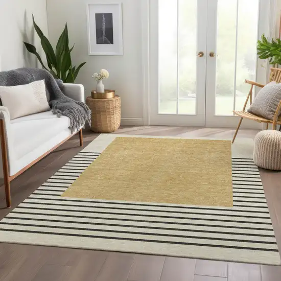 Gold Ivory And Black Striped Washable Area Rug With UV Protection Photo 3