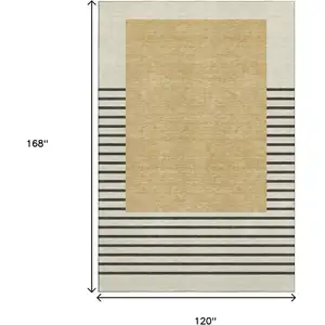 Photo of Gold Ivory And Black Striped Washable Area Rug With UV Protection