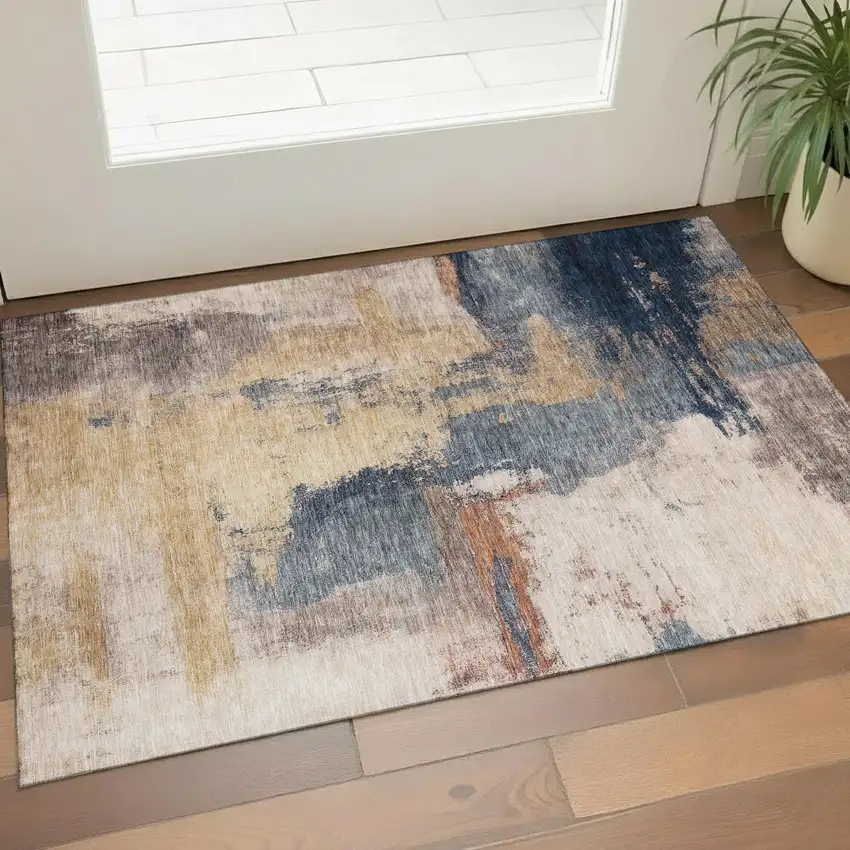 Gold Ivory And Blue Abstract Washable Area Rug With UV Protection Photo 1