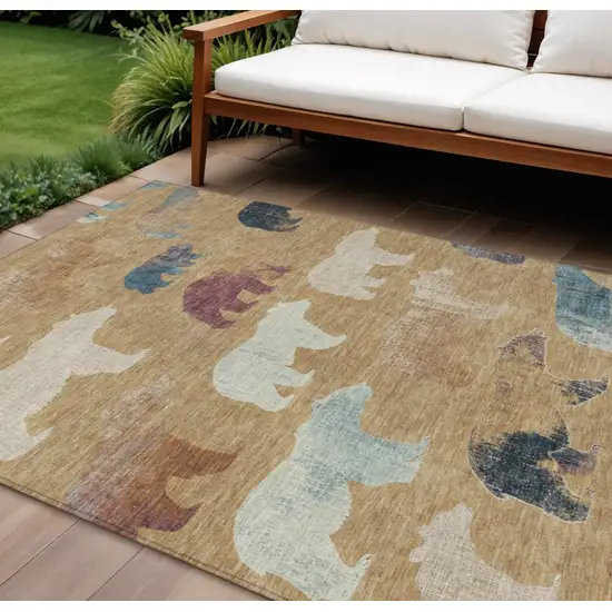 Gold Ivory And Blue Animal Print Washable Indoor Outdoor Area Rug Photo 1