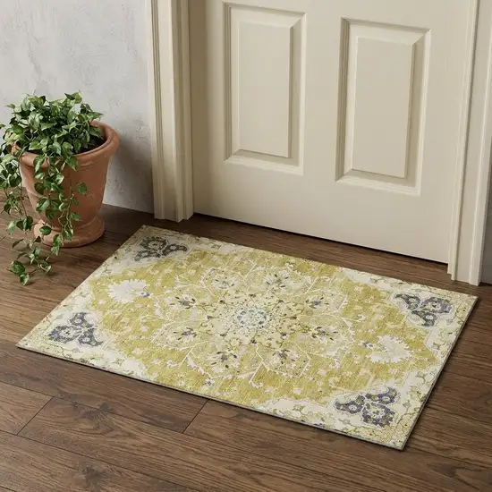 Gold Ivory And Blue Floral Medallion Distressed Washable Area Rug With UV Protection Photo 1