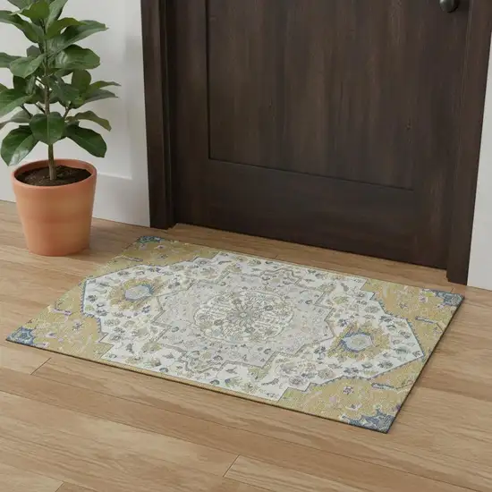 Gold Ivory And Blue Oriental Washable Area Rug With UV Protection Photo 1