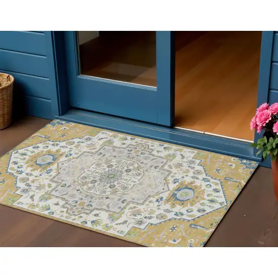 Gold Ivory And Blue Oriental Washable Indoor Outdoor Area Rug Photo 1