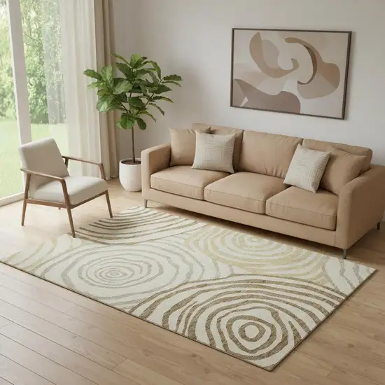 Gold Ivory And Brown Abstract Washable Area Rug With UV Protection Photo 1