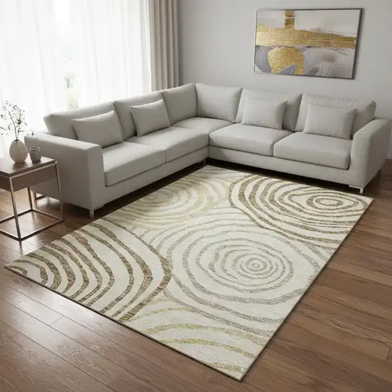 Gold Ivory And Brown Abstract Washable Area Rug With UV Protection Photo 2