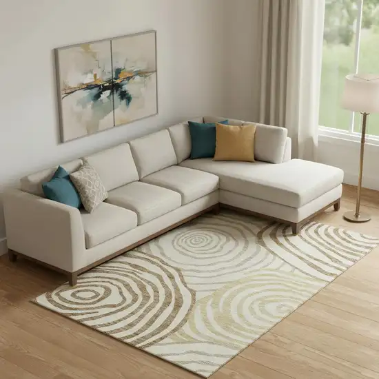 Gold Ivory And Brown Abstract Washable Area Rug With UV Protection Photo 1