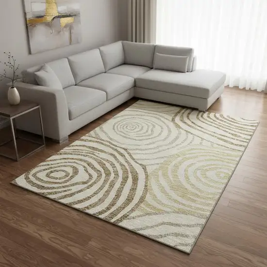 Gold Ivory And Brown Abstract Washable Area Rug With UV Protection Photo 2