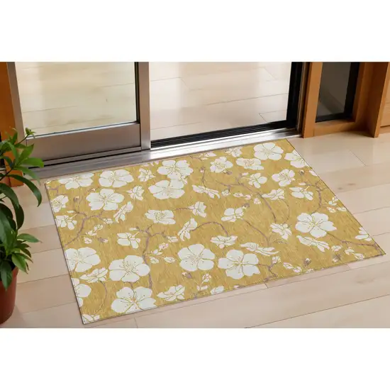 Gold Ivory And Brown Floral Washable Indoor Outdoor Area Rug Photo 1