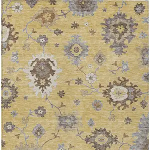 Photo of Gold Ivory And Brown Floral Washable Indoor Outdoor Area Rug