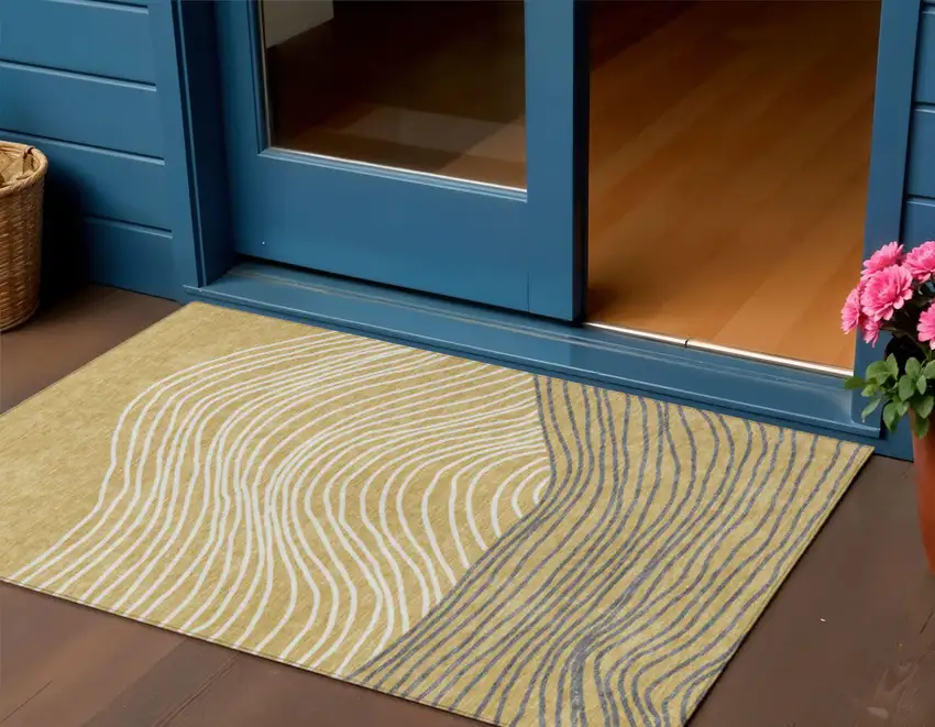 Gold Ivory And Charcoal Striped Washable Indoor Outdoor Area Rug Photo 1