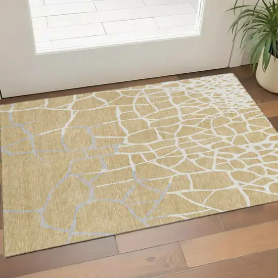 Gold Ivory And Gray Abstract Geometric Washable Area Rug With UV Protection Photo 1
