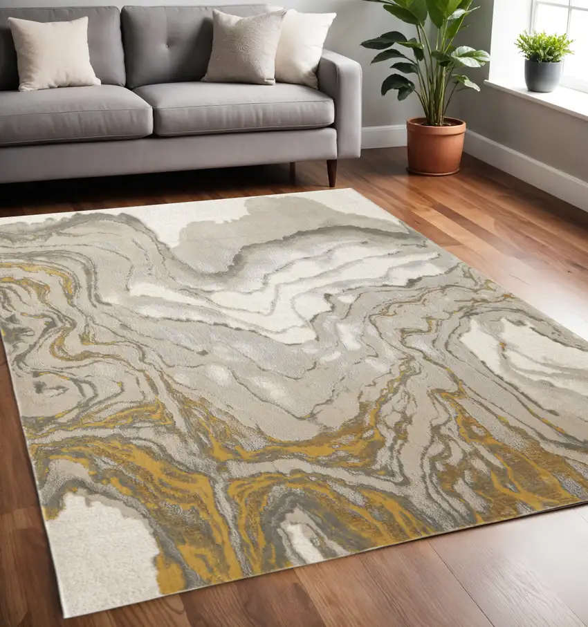 Gold Ivory And Gray Abstract Area Rug Photo 1