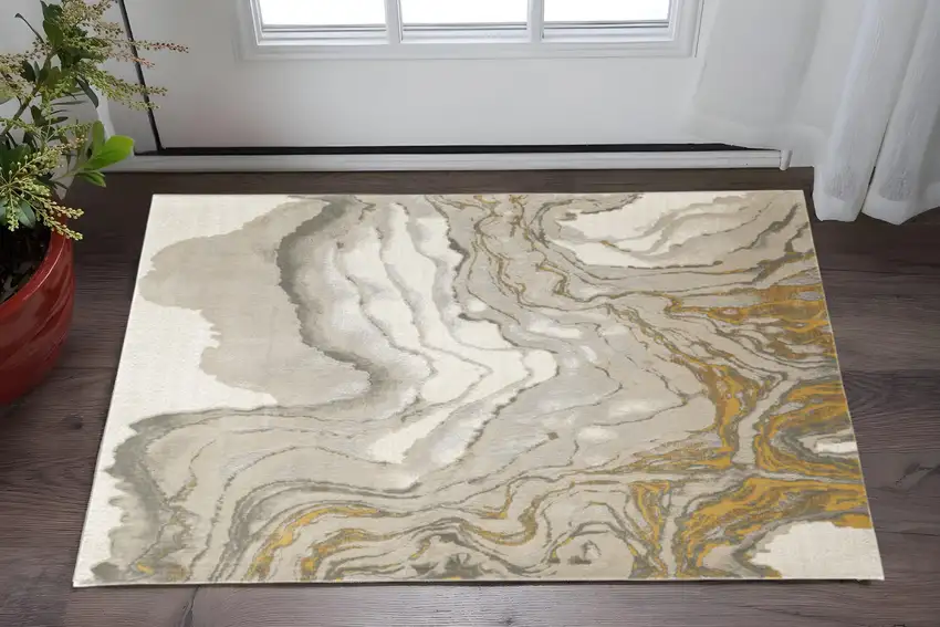Gold Ivory And Gray Abstract Stain Resistant Area Rug Photo 1