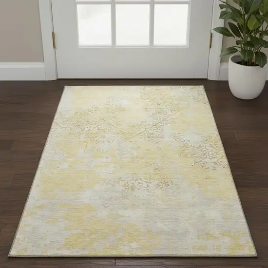 Gold Ivory And Gray Abstract Washable Area Rug With UV Protection Photo 2