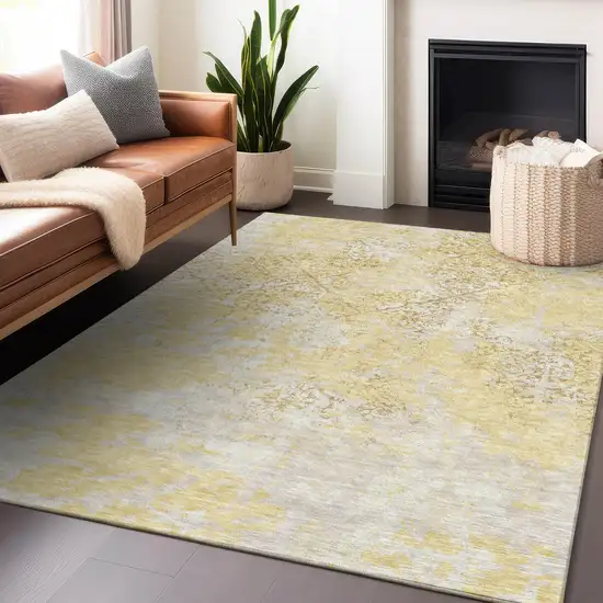 Gold Ivory And Gray Abstract Washable Area Rug With UV Protection Photo 6