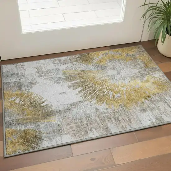 Gold Ivory And Gray Abstract Washable Area Rug With UV Protection Photo 2