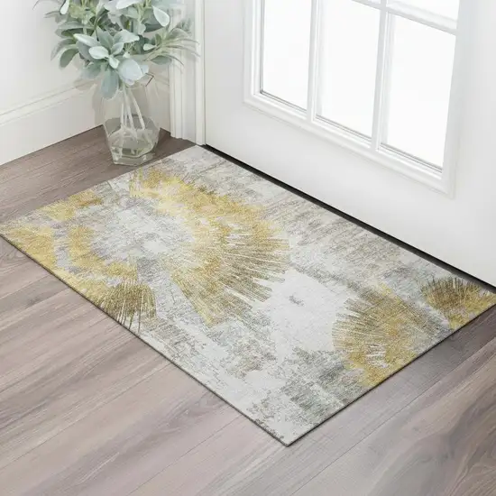 Gold Ivory And Gray Abstract Washable Area Rug With UV Protection Photo 1