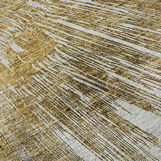 Gold Ivory And Gray Abstract Washable Area Rug With UV Protection Photo 8
