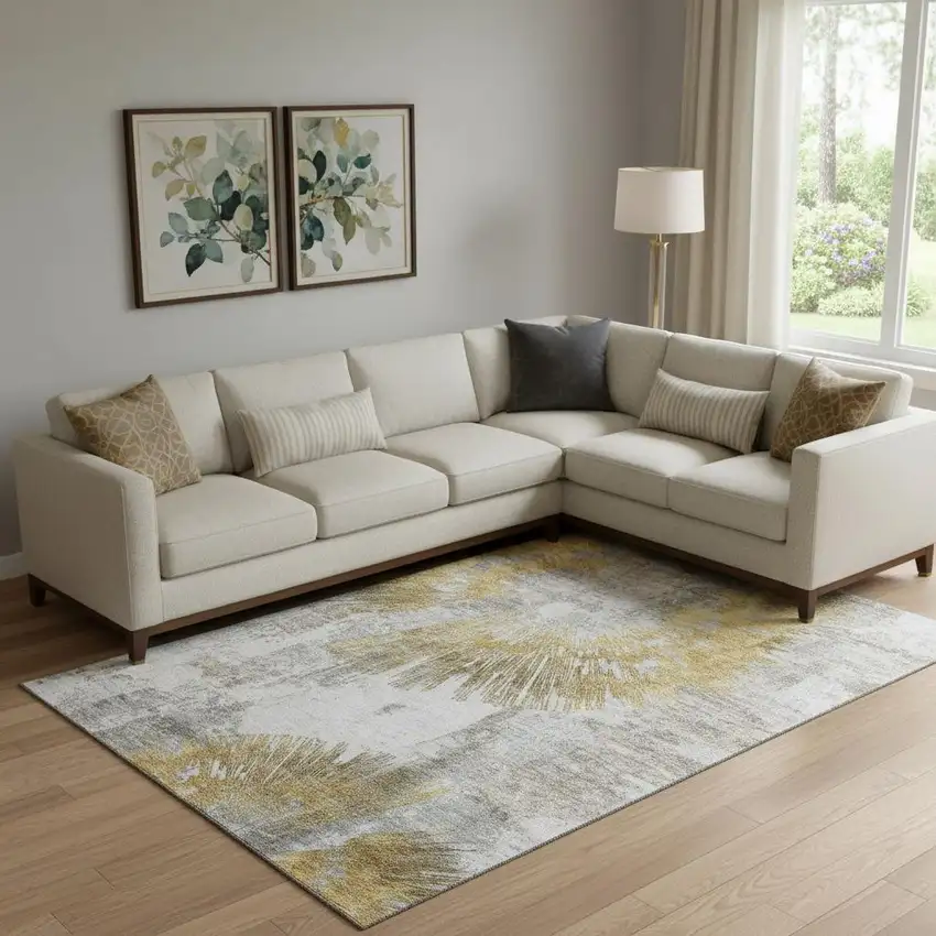 Gold Ivory And Gray Abstract Washable Area Rug With UV Protection Photo 1