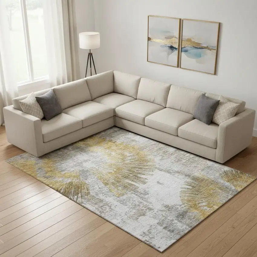 Gold Ivory And Gray Abstract Washable Area Rug With UV Protection Photo 1