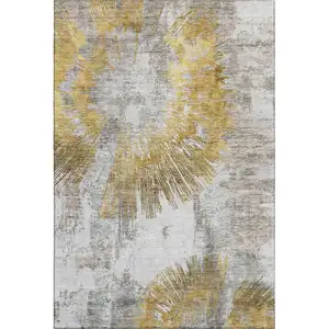 Photo of Gold Ivory And Gray Abstract Washable Area Rug With UV Protection