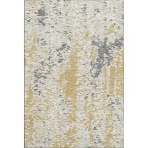 Photo of Gold Ivory And Gray Abstract Washable Area Rug With UV Protection