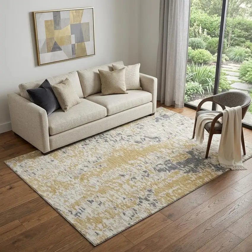 Gold Ivory And Gray Abstract Washable Area Rug With UV Protection Photo 1
