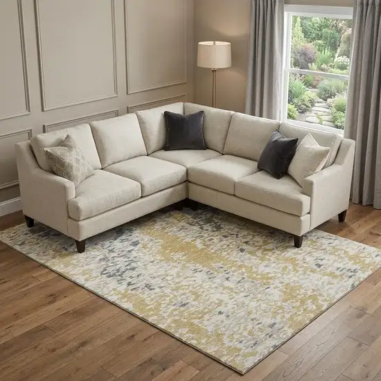 Gold Ivory And Gray Abstract Washable Area Rug With UV Protection Photo 1