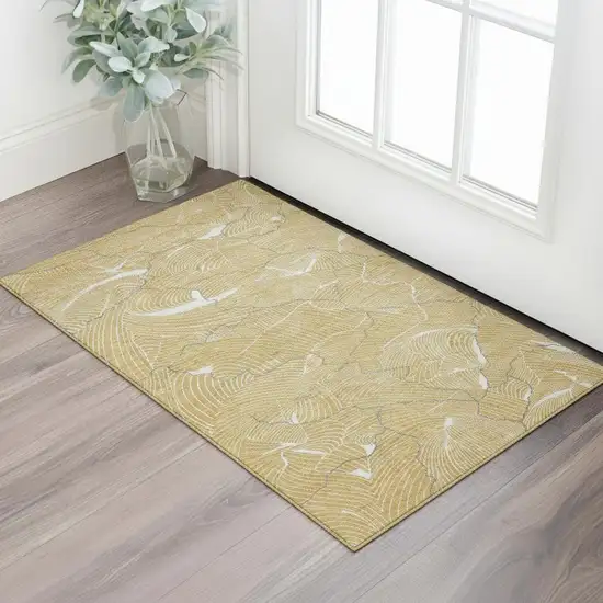 Gold Ivory And Gray Abstract Washable Area Rug With UV Protection Photo 2