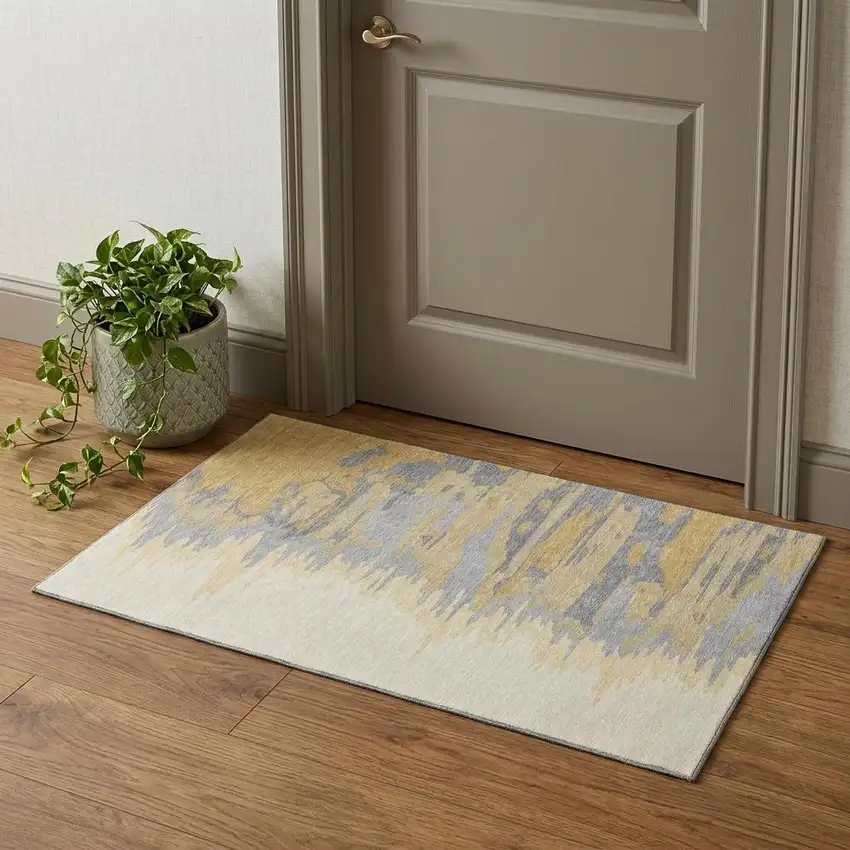 Gold Ivory And Gray Abstract Washable Area Rug With UV Protection Photo 1