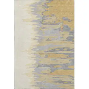 Photo of Gold Ivory And Gray Abstract Washable Area Rug With UV Protection