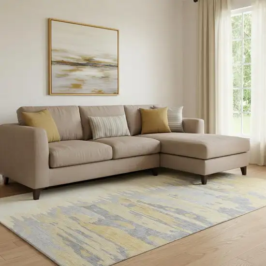 Gold Ivory And Gray Abstract Washable Area Rug With UV Protection Photo 2