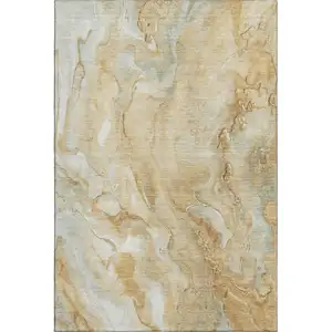 Photo of Gold Ivory And Gray Abstract Washable Area Rug With UV Protection