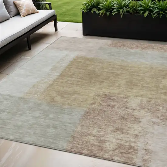Gold Ivory And Gray Abstract Washable Indoor Outdoor Area Rug Photo 1