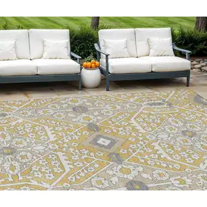 Photo of Gold Ivory And Gray Floral Washable Indoor Outdoor Area Rug