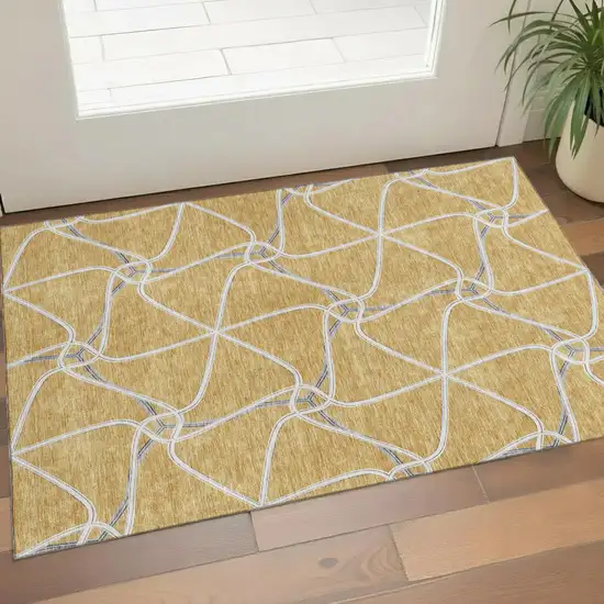 Gold Ivory And Gray Geometric Washable Area Rug With UV Protection Photo 1