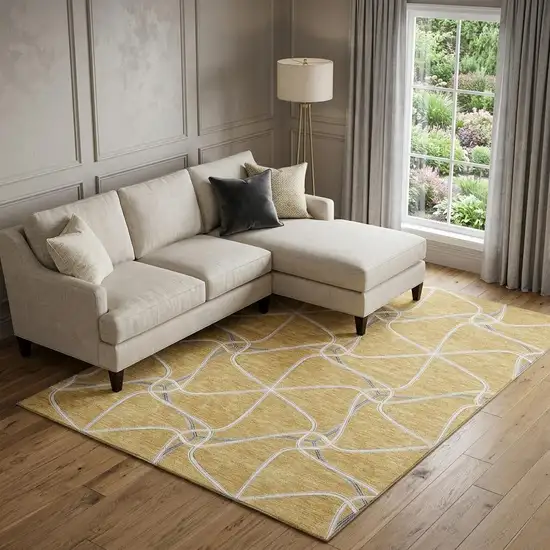 Gold Ivory And Gray Geometric Washable Area Rug With UV Protection Photo 1