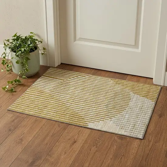 Gold Ivory And Gray Geometric Washable Area Rug With UV Protection Photo 1