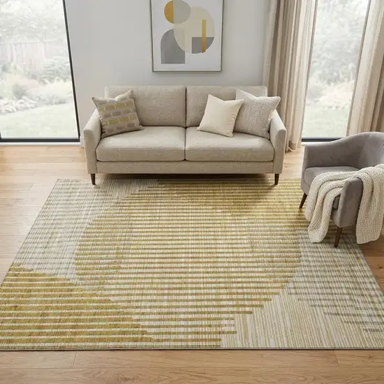 Gold Ivory And Gray Geometric Washable Area Rug With UV Protection Photo 1