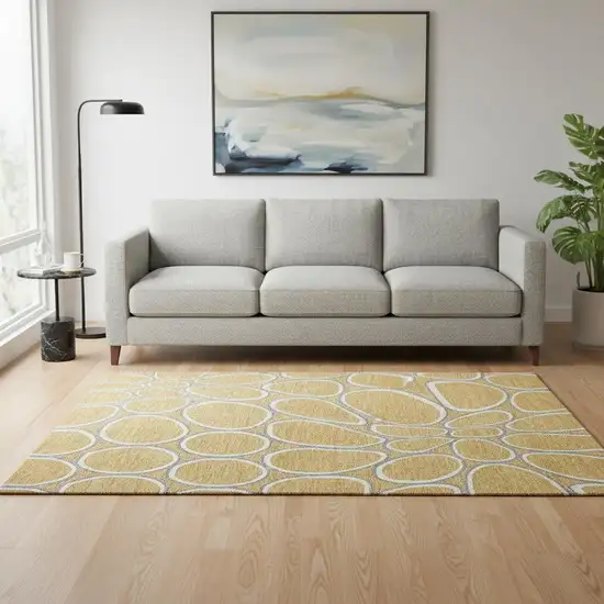 Gold Ivory And Gray Geometric Washable Area Rug With UV Protection Photo 2