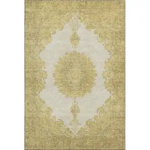 Photo of Gold Ivory And Gray Oriental Washable Area Rug With UV Protection