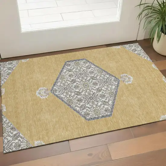 Gold Ivory And Gray Oriental Washable Area Rug With UV Protection Photo 1