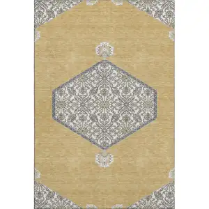 Photo of Gold Ivory And Gray Oriental Washable Area Rug With UV Protection