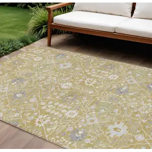 Photo of Gold Ivory And Gray Oriental Washable Indoor Outdoor Area Rug