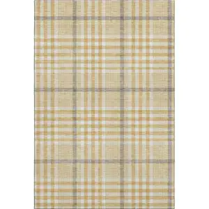 Photo of Gold Ivory And Gray Plaid Washable Area Rug With UV Protection