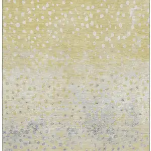 Photo of Gold Ivory And Gray Polka Dot Washable Area Rug With UV Protection