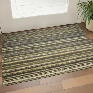 Photo of Gold Ivory And Gray Striped Washable Area Rug With UV Protection