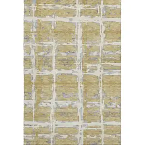 Photo of Gold Ivory And Gray Striped Washable Area Rug With UV Protection